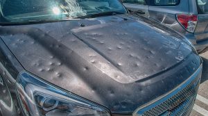 voiture grêlée — carrosserie cabossée par la grêle, réparation DSP et franchise offerte en Île-de-France